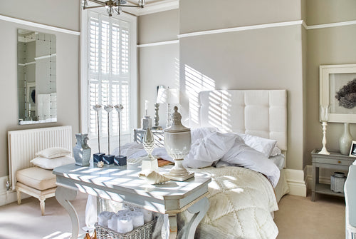 White Tier-on-Tier shutters with independent panels
