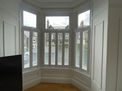 Close up of café style plantation shutters