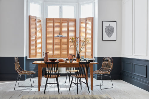 Café style shutters in a bedroom window
